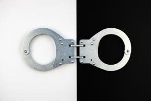 Handcuffs on a black and white background.